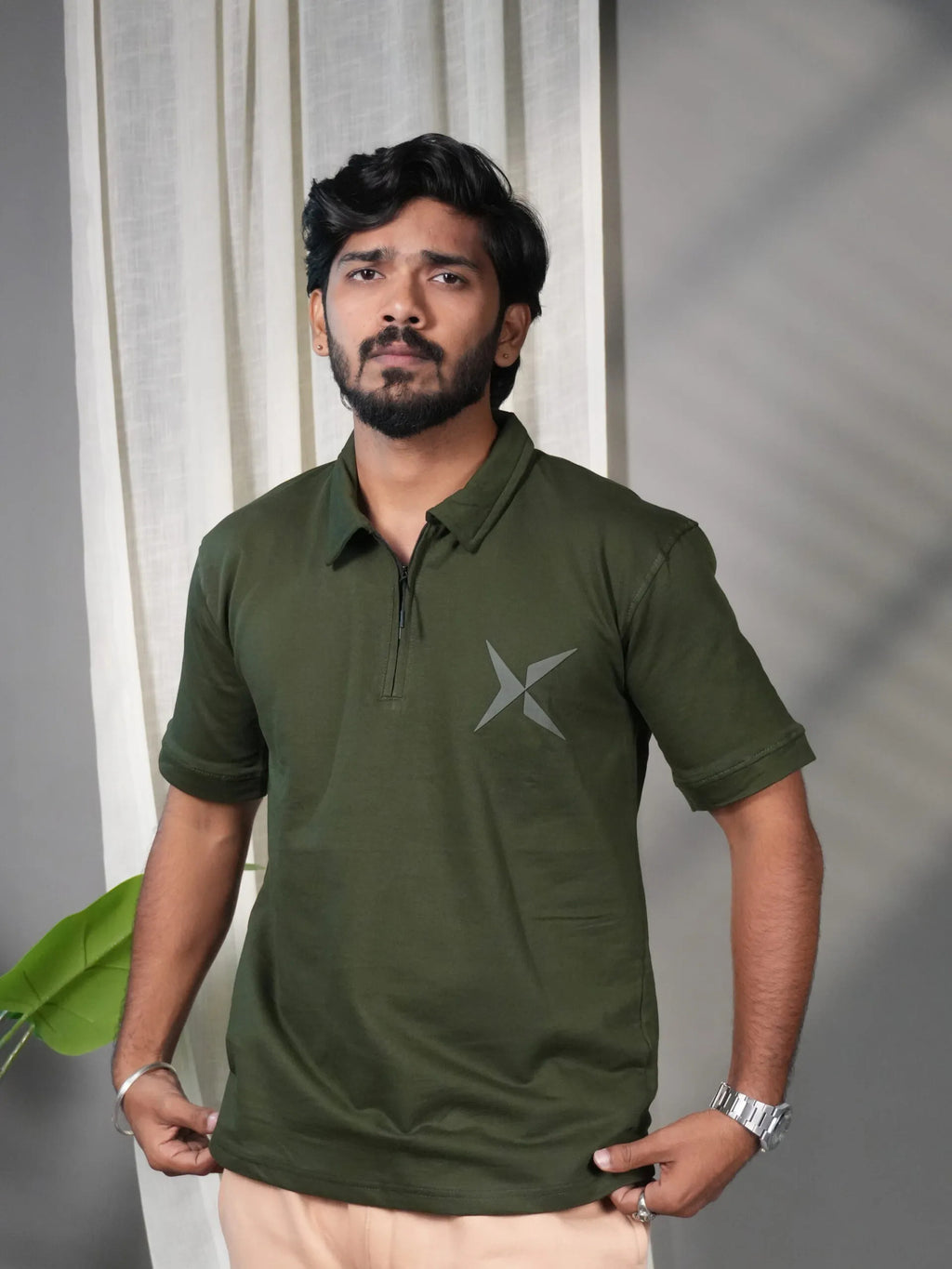 Man wearing Olive Polo T-shirt