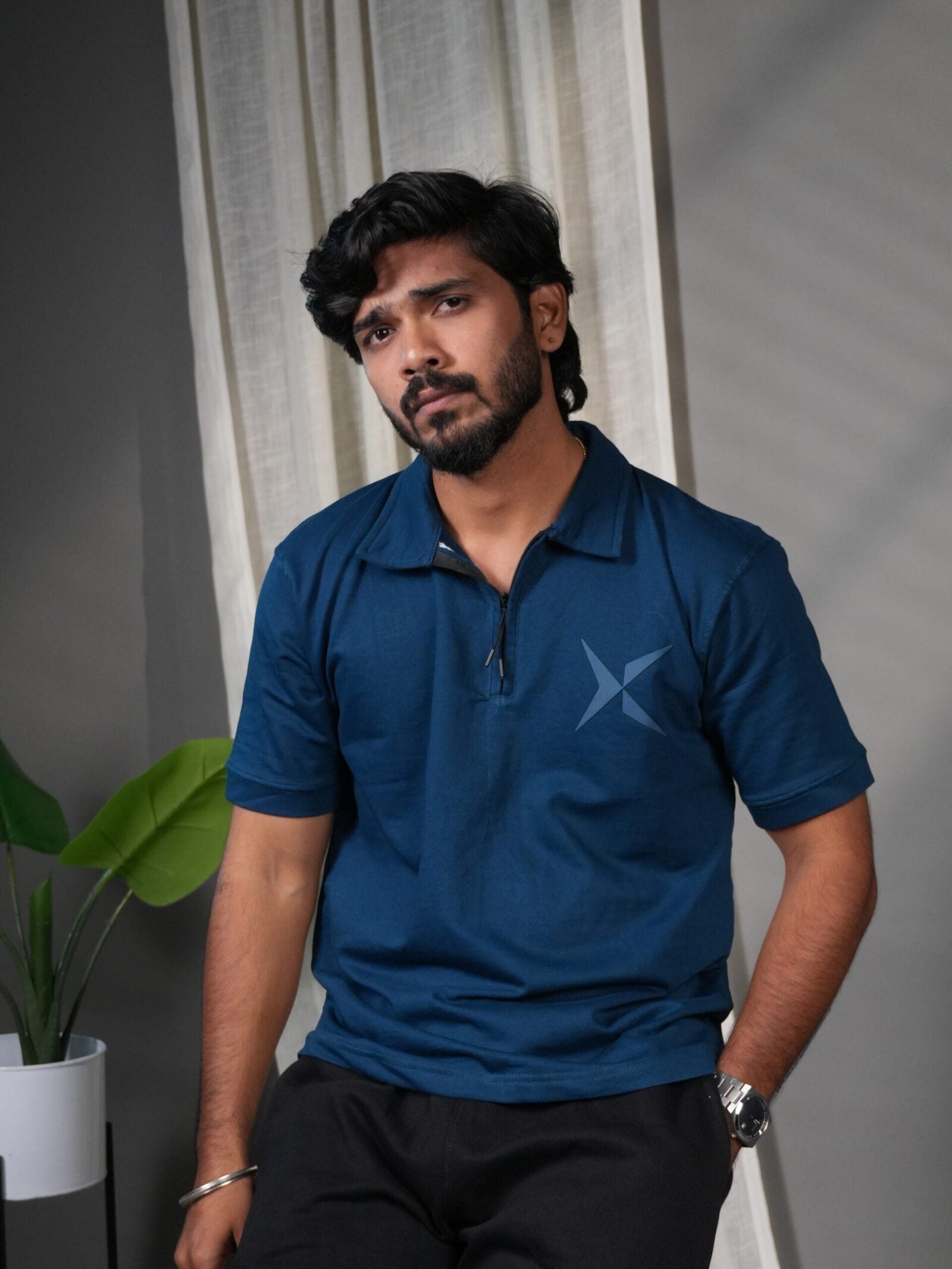 Man wearing Blue Polo T-Shirt