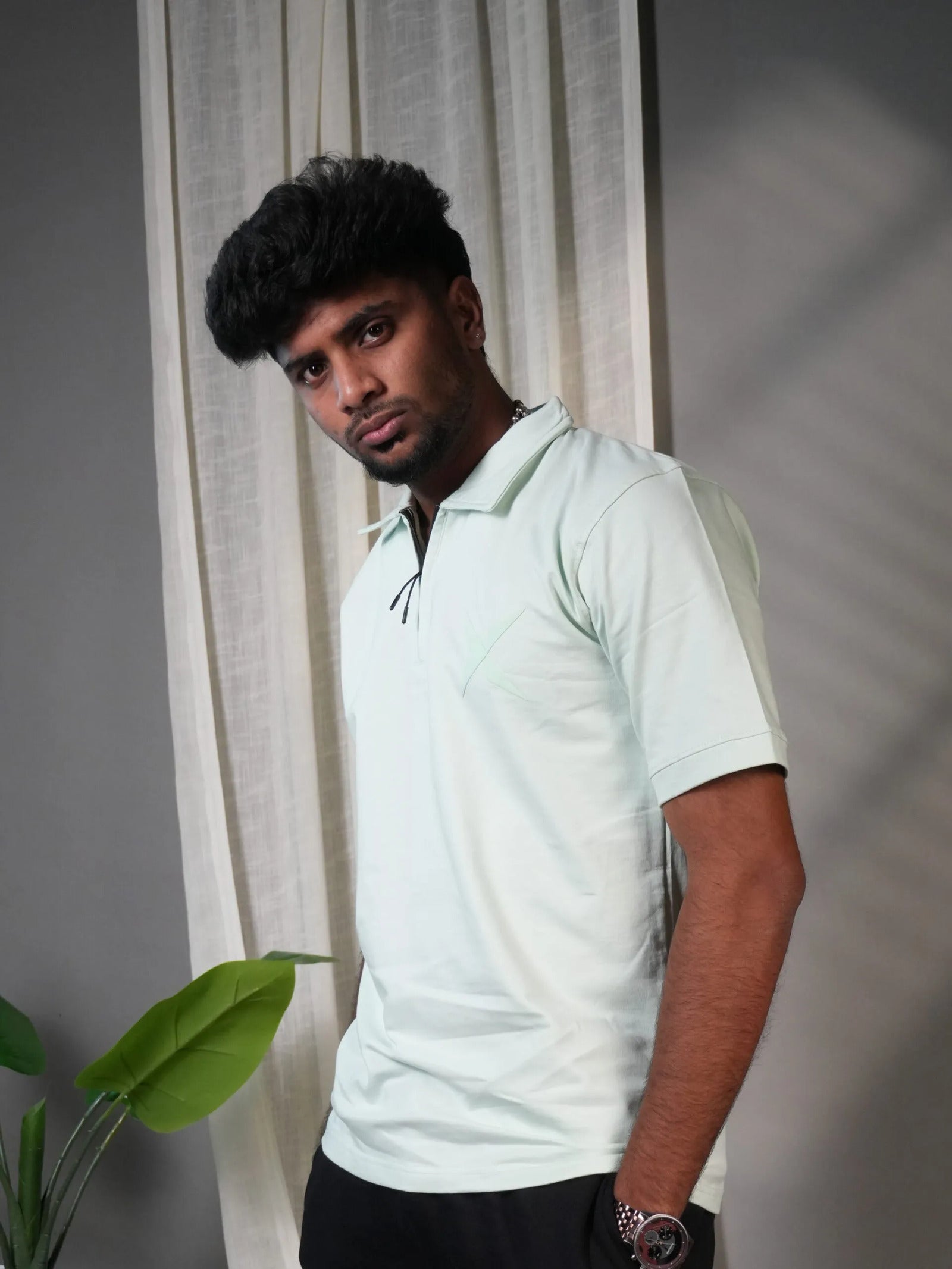Man wearing Aqua Green Polo T-Shirt